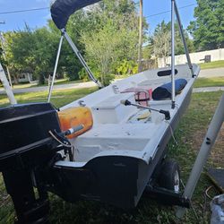 14ft Fiberglass Boat With A 25hp Evenrude 2 Stroke Outboard Motor