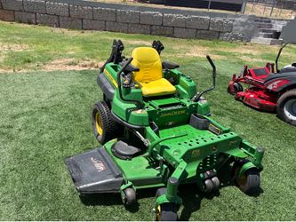 2012 John Deere commercial grade zero turn with 60” deck.