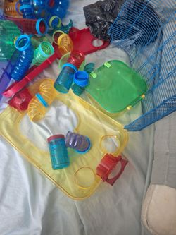 Hamster cage and toys, sand bathing container, water despenser, and other connecting accessories