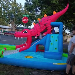 Dinosaur blow up slide