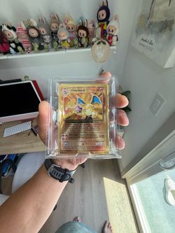 Metal Charizard Celebration NM in holder