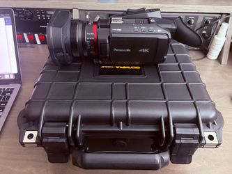Professional 4K video camera kit — ready for recording, includes extra batteries & case