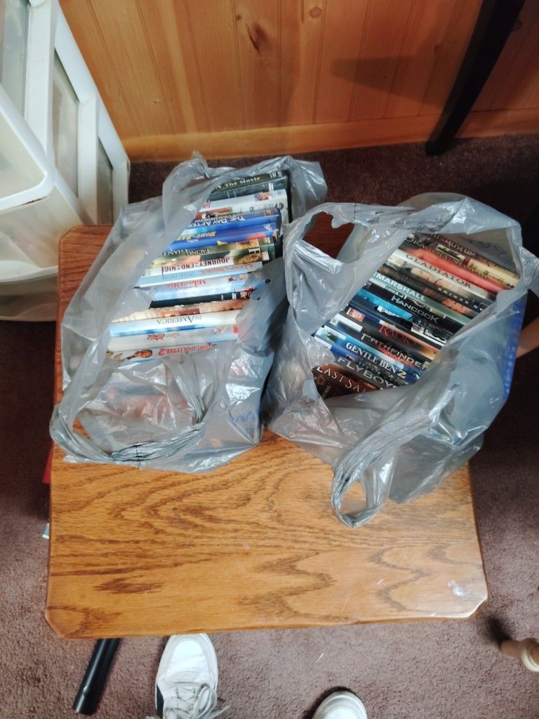 2 Bags Of DVDs Over 20 Titles