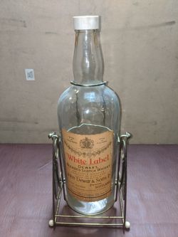 Dewars swinging Scottish bottle display