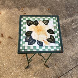 Tile top metal stand approximately 2 1/2 foot tall