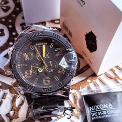 Nixon on sale black gold