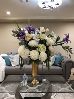 Ceramic vase with silk flowers arrangement