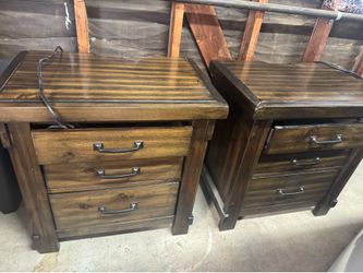 Pair of dark wood nightstands with USB charging