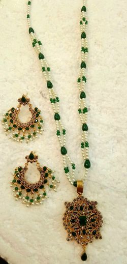 Stunning long pendants with earrings.