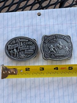 Two junior size rodeo belt buckles