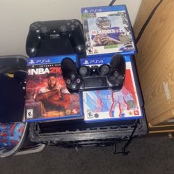 PlayStation 4 (PS4) with Games & Controller