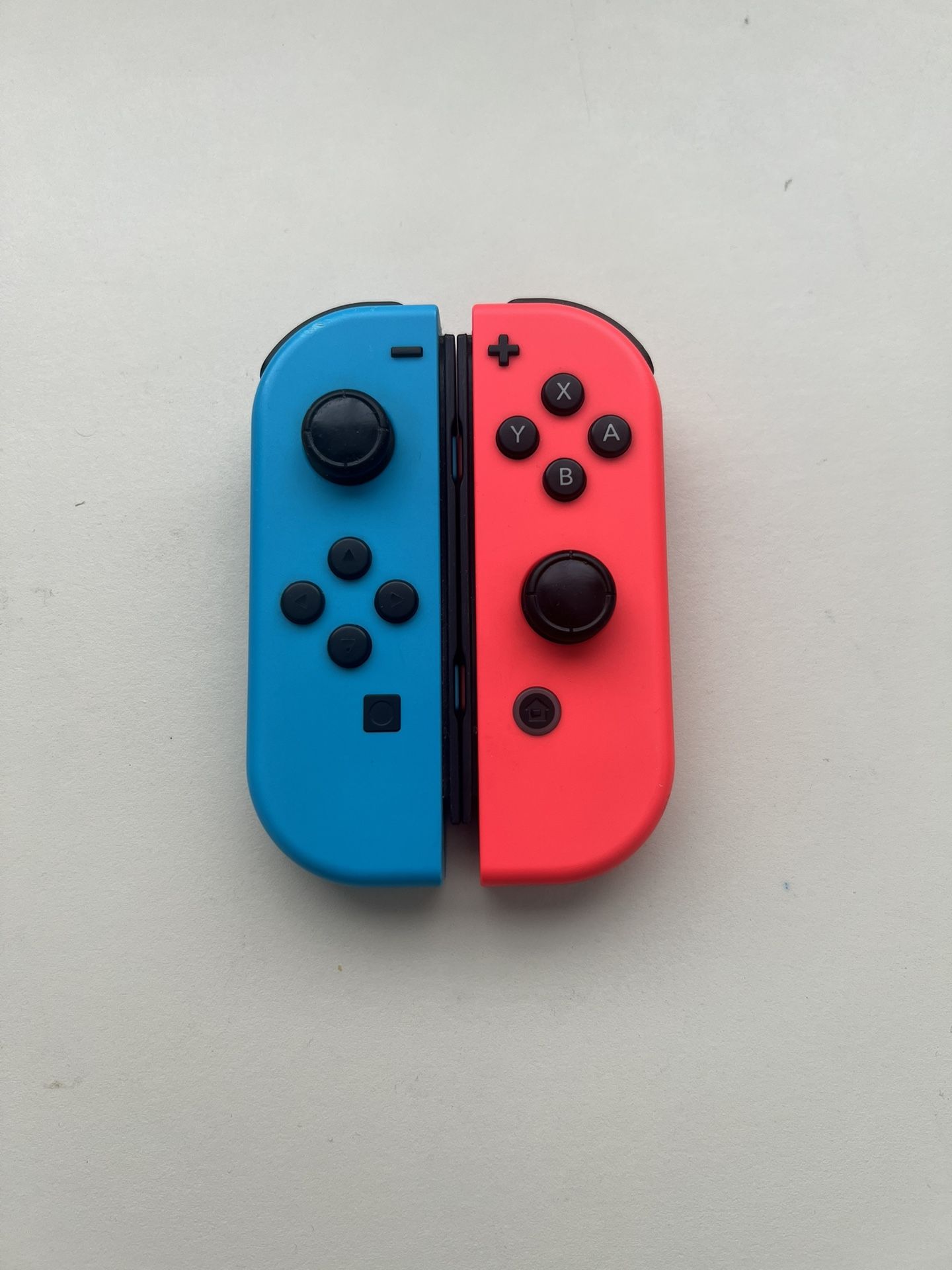 (FOR PARTS) Red and Blue Nintendo Switch Joy-Cons