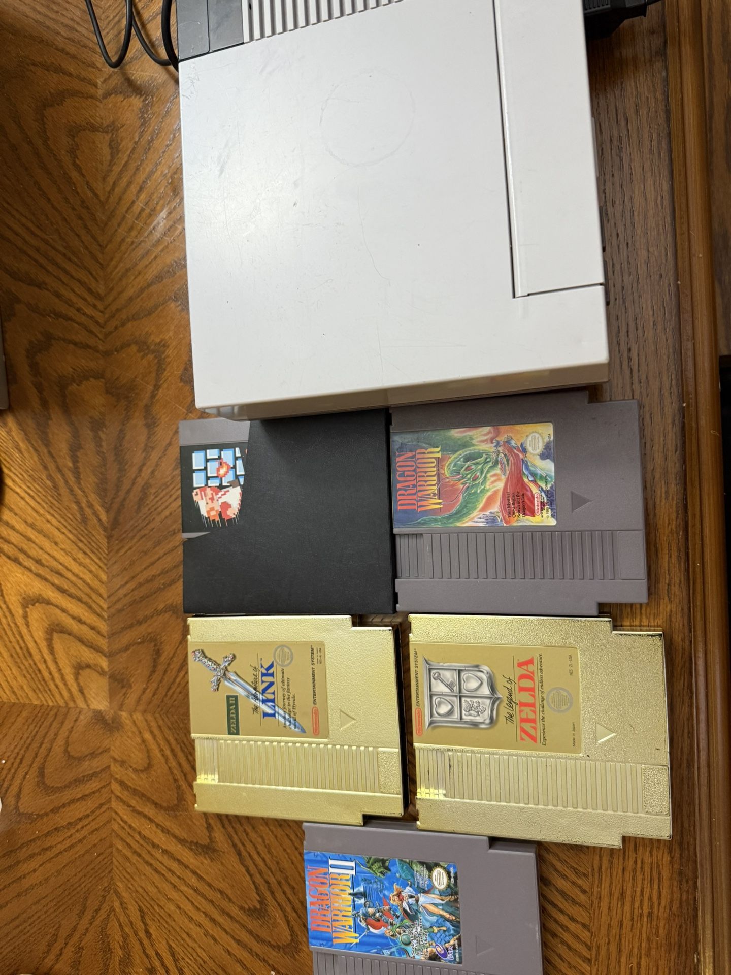 NES Nintendo Original Console with 2 controllers and 5 cartridge 2 zelda, 1 super mario and 2 Dragon warriors Will not separate Tested and it works