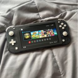 Nintendo Switch Lite (with 6 games installed)