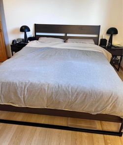 Queen bed frame with two matching nightstands