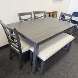 Dining table with 4 chairs and a bench