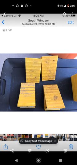 Camco wheel chock. Helps keep your RV or Trailer in place.