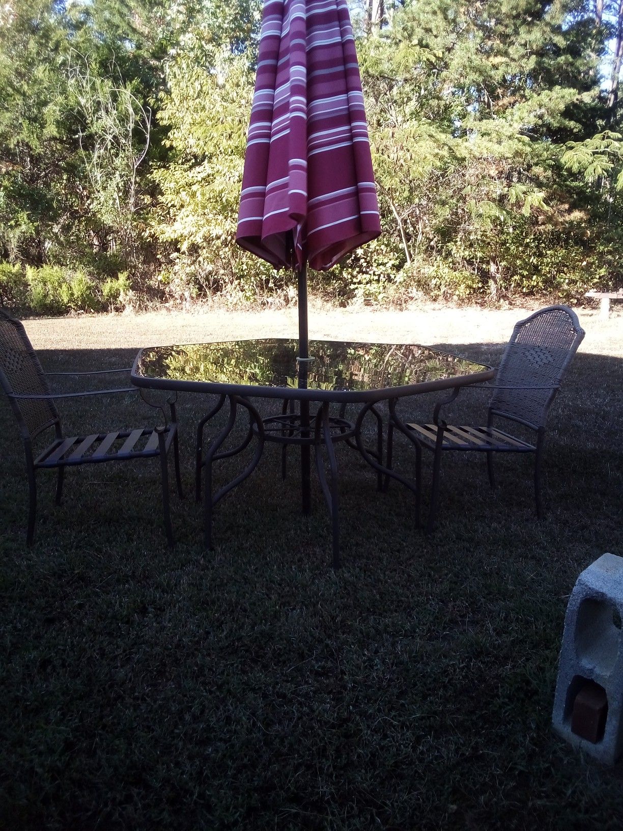 Glass top patio table/ with 2 chairs