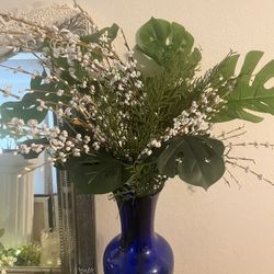 Beautiful Blue Vase with Greenery and White Babys Breath for Home Decor and Any Room