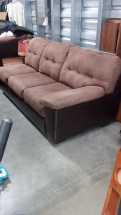 L shape couch with open end.