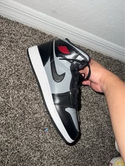 Air Jordan 1 Mid sneakers in the "Shadow Red" colorway.