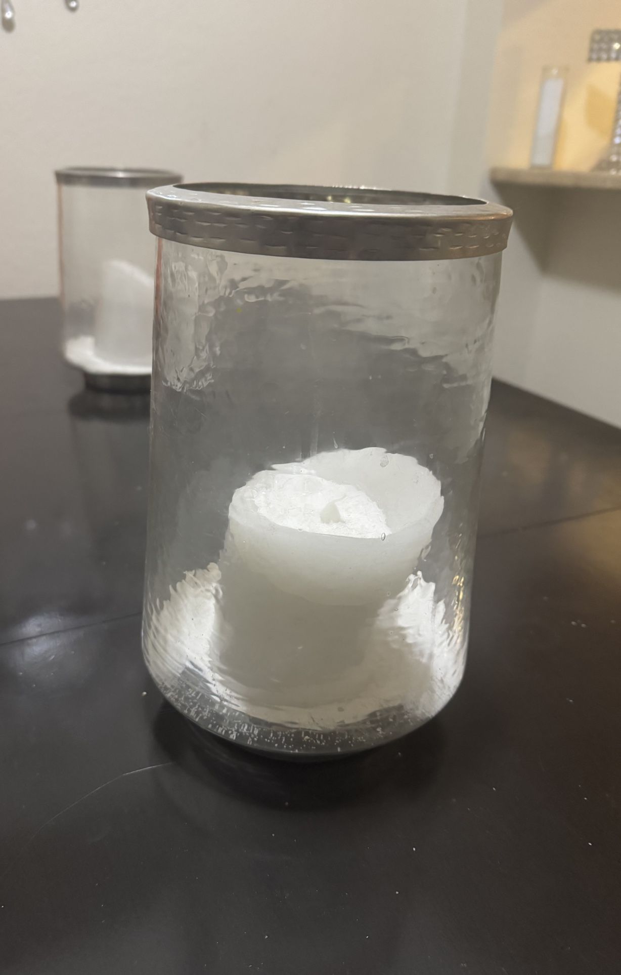 Large Candle Holder Has Sand And Fake Candle In It