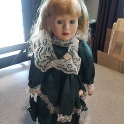 Vintage Porcelain Doll In Green Dress