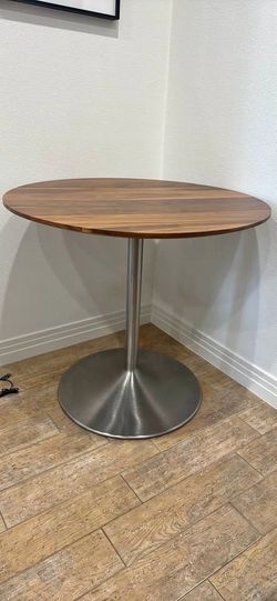 Aria round table from Room&Board retails for $1400 (located in Playa Vista)