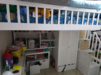 Full loft bed with closet and office.  Includes full matress