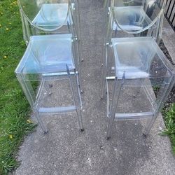 4 clear bar stools  great condition 