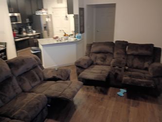 Reclining couch and loveseat.  With cup holders