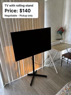 Samsung TV with rolling stand