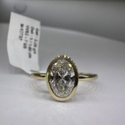 1.00 carat E VVS2 oval Bezel Solitaire Engagement Ring
