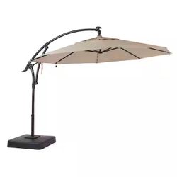 Home Decorators Collection 11 ft. LED Round Offset Outdoor Patio Umbrella in Sunbrella Spectrum Sand