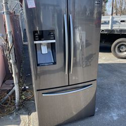 Samsung French door refrigerator with 90 day warranty