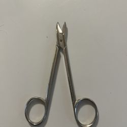 pair of pedicure scissors or specialized crown scissors used for cutting thick nails or dental materials.  Design: Features short blades for straight 