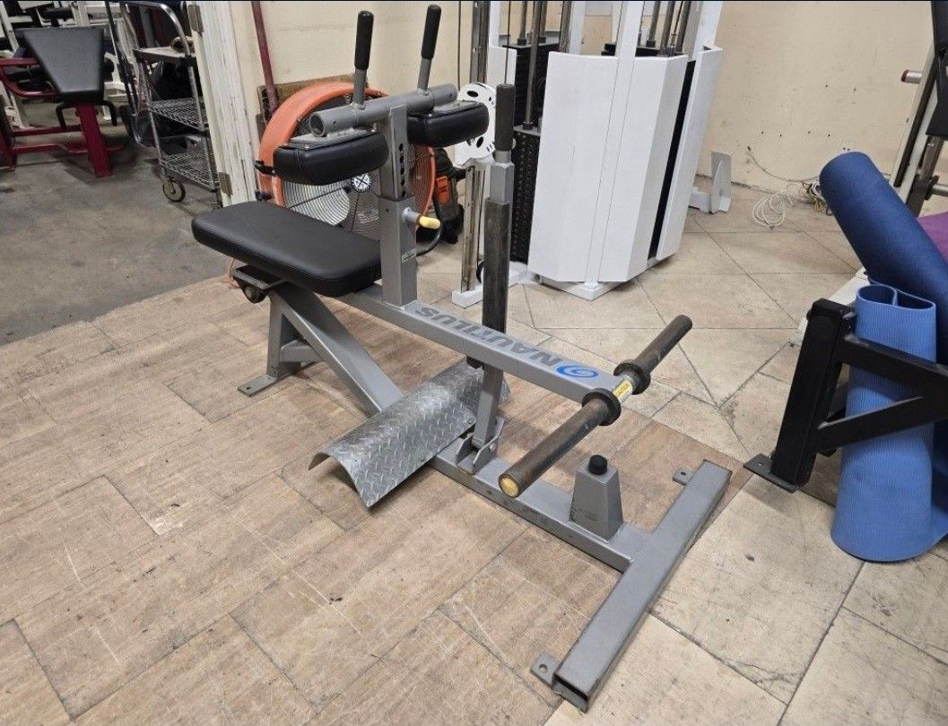 Nautilus xpload seated calf plate loaded tommercial gym equipment exercise fitness