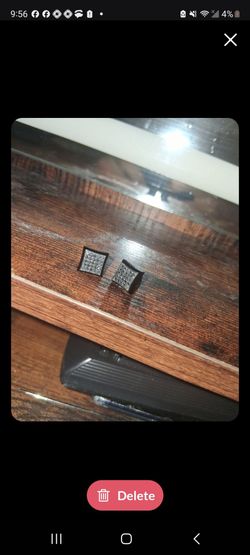Men's 1/4 crt black diamond earrings.