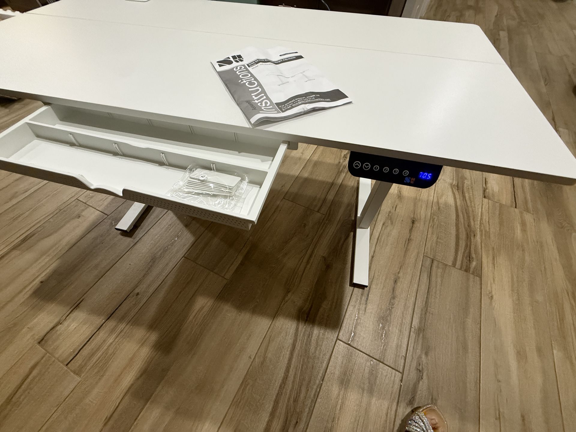 Brand new 55” x 28” adjustable electric desk
