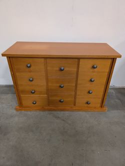 Warm Honey Wood Nine-Drawer Storage Chest