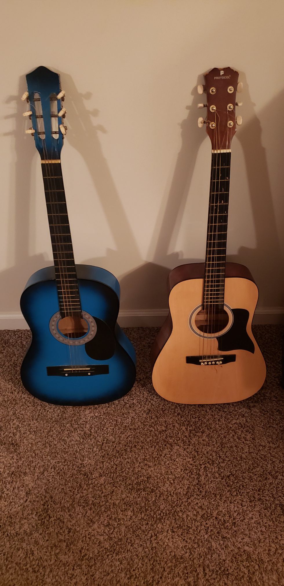 Two 6 string Acoustic Guitars