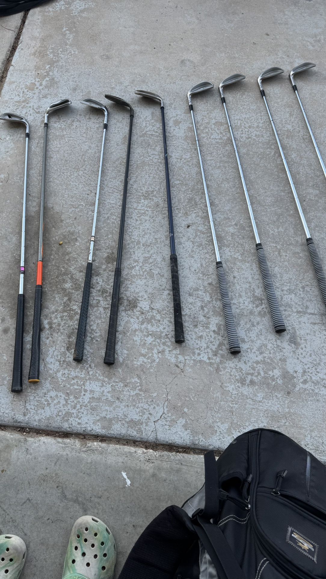 Mixed Set Of Golf Clubs