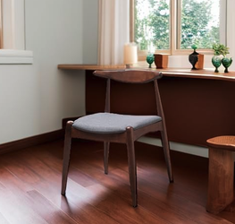 Mid-century modern dining chair with grey seat cushion