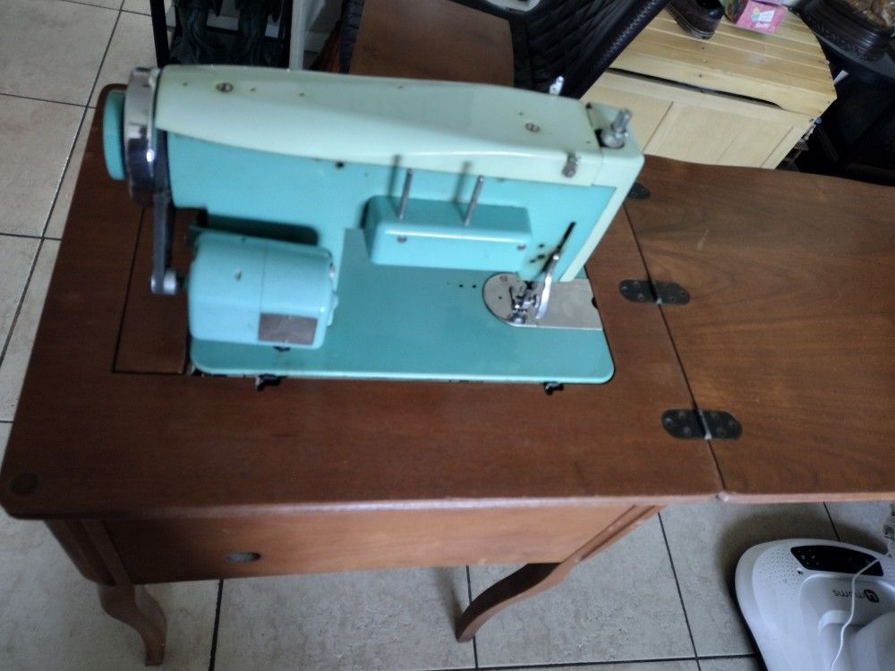 Vintage Sewing Machine. By White . With Cabinet Table