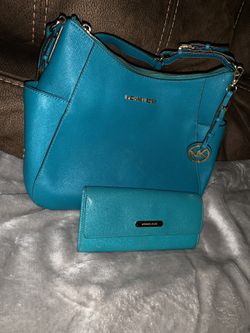 Michael Kors purse with matching wallet. Used a few times