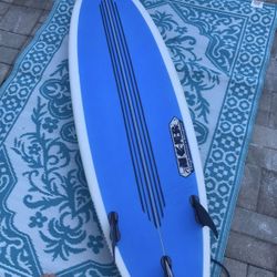 Nightmare shapes surfboard