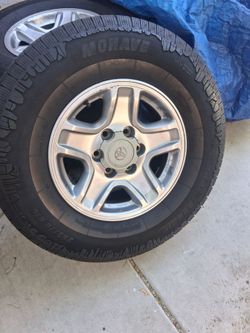 4 stock  4runner  wheels and tires..265/70/16 tires