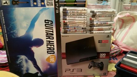 PS 3 with many games and guitar hero