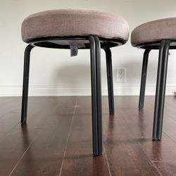two twin baby pink stools 