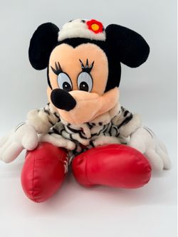 Disney Minnie Mouse plush doll dressed as Cruella de Vil,
